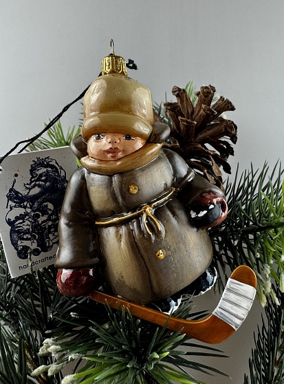 Мальчик с клюшкой, Mostowski